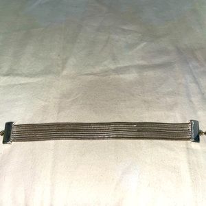 Silver tone multi strand toggle clasp bracelet. Classy and stylish